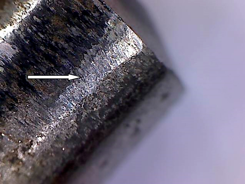 Фото 31. Стачивание металла ролика по краям. Вид через микроскоп – увеличение в 10 раз