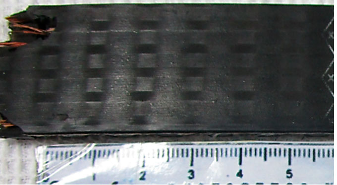 Фото 3.  Внешний вид  фрагмента разорванного ремня ГРМ  с внешней стороны