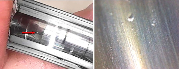 Фото 26,27. Повреждения  на дорожке качения внешнего кольца – показано красной стрелкой