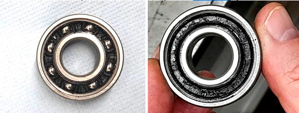 Фото 15,16. Наложения грязной смазки (чёрного цвета)  на сепараторе подшипника, между внешним и внутренним кольцом